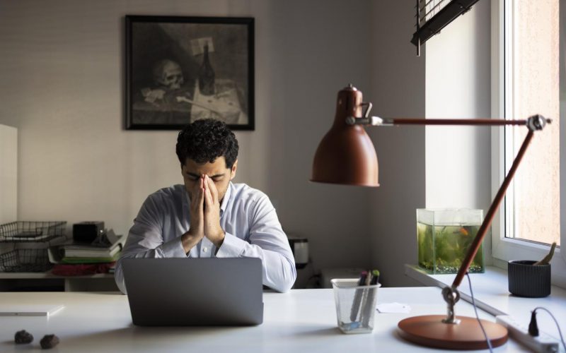 anxious-man-working-front-view anxious-man-working-front-view