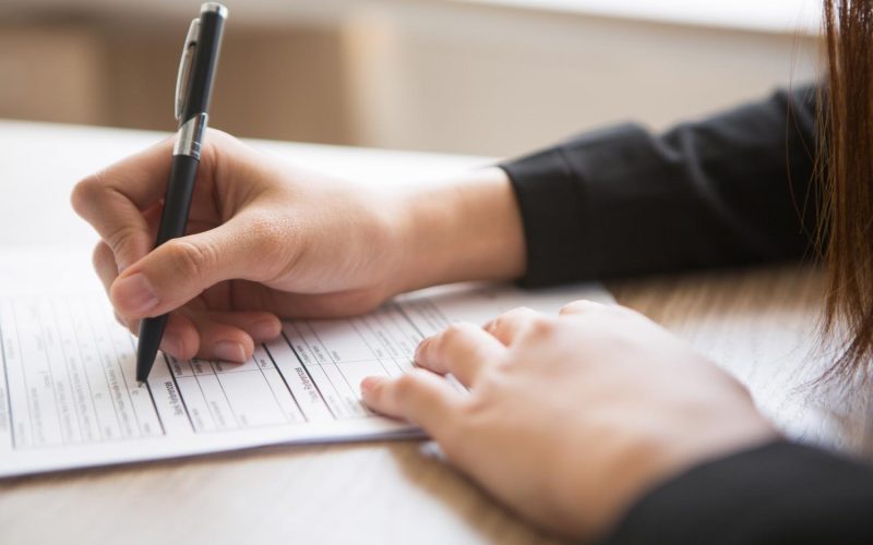 cropped-view-woman-filling-application-form cropped-view-woman-filling-application-form