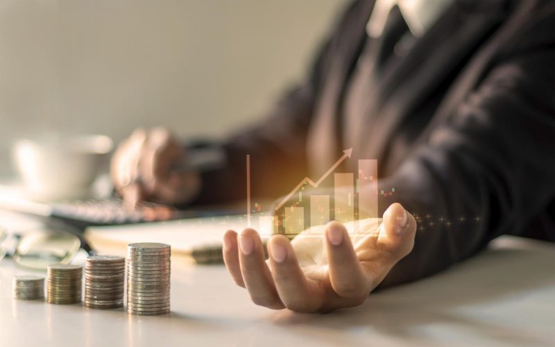financial-growth-graph-hand-business-people-are-documenting-office-finance-financial-ideas-loan-investments