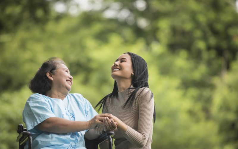 granddaughter-talking-with-her-grandmother-sitting-wheelchair-cheerful-concept-happy-family granddaughter-talking-with-her-grandmother-sitting-wheelchair-cheerful-concept-happy-family