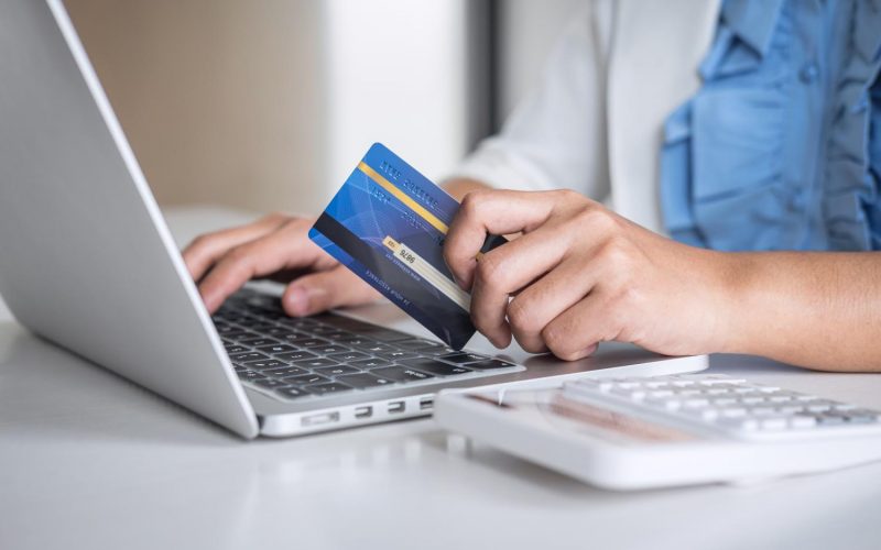 hands-holding-credit-card-typing-laptop-online-shopping-payment-make-purchase hands-holding-credit-card-typing-laptop-online-shopping-payment-make-purchase