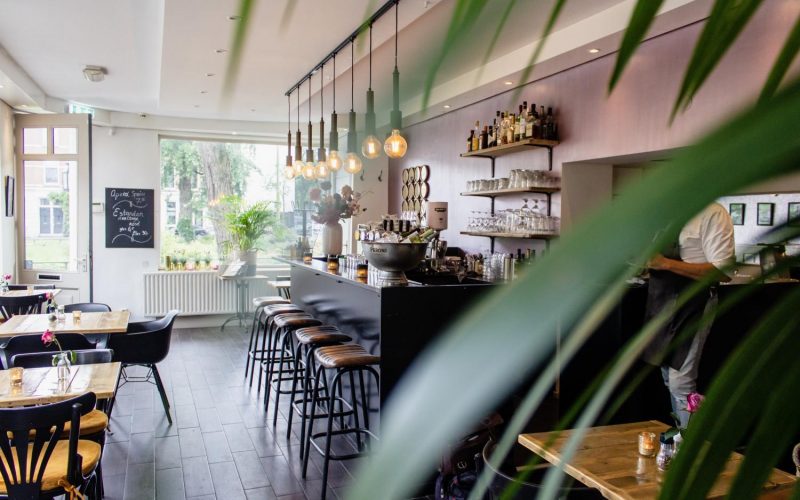 interior-shot-cafe-with-chairs-near-bar-with-wooden-tables interior-shot-cafe-with-chairs-near-bar-with-wooden-tables