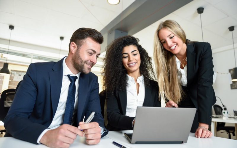 multi-ethnic-group-three-businesspeople-meeting-modern-office-two-women-man-wearing-suit-looking-laptop-computer multi-ethnic-group-three-businesspeople-meeting-modern-office-two-women-man-wearing-suit-looking-laptop-computer