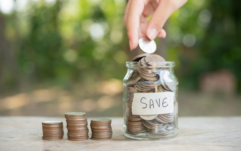 saving-money-concept-preset-by-male-hand-putting-money-coin-stack-growing-business-arrange-coins-into-heaps-with-hands-content-about-money saving-money-concept-preset-by-male-hand-putting-money-coin-stack-growing-business-arrange-coins-into-heaps-with-hands-content-about-money